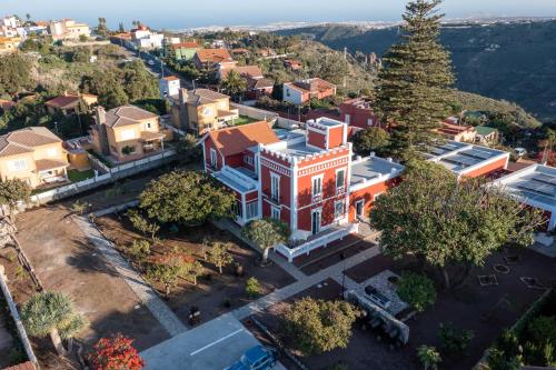an overhead view of a building in a town at Albor Suites in Santa Brígida