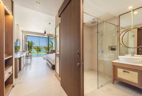 a bathroom with a shower and a sink and a tub at The Culture Samui in Bangrak Beach