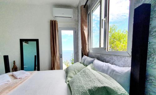 Postel nebo postele na pokoji v ubytování Casa do Maracuja