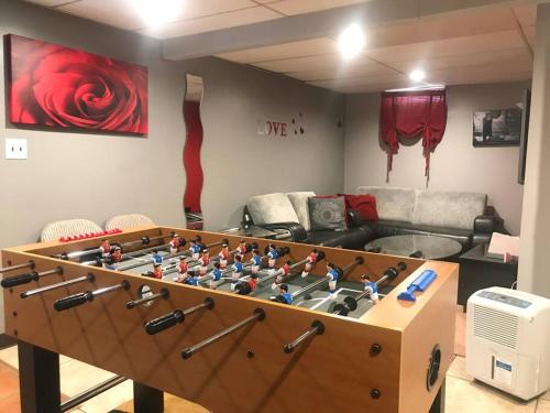 a large chess board in a living room at Beautiful Chalet with Hot Tub & Sauna in Poconos in Long Pond