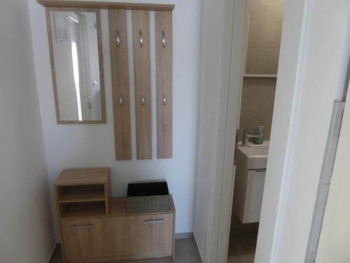 Kúpeľňa v ubytovaní Apartament Wioletta Ciovo Okrug Gornji