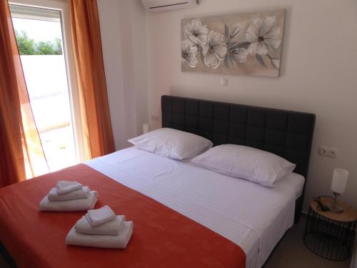 Posteľ alebo postele v izbe v ubytovaní Apartament Wioletta Ciovo Okrug Gornji