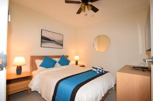 Кровать или кровати в номере Arena Condos Aruba - few steps from Eagle Beach!