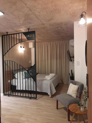 a room with two beds and a staircase in it at Estación Balcarce in Salta