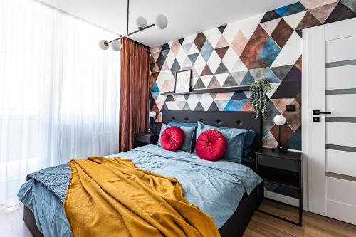 Apartament Frida Katowice Ligota tesisinde bir odada yatak veya yataklar