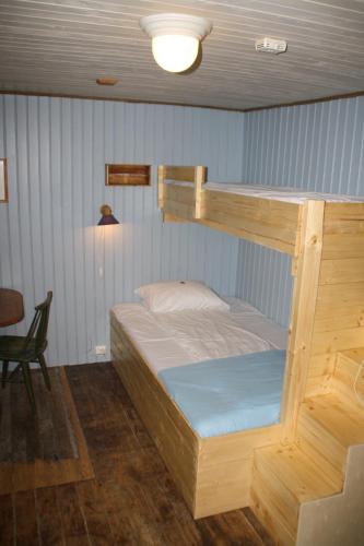 Cama o camas de una habitación en Holmvik Brygge Nyksund