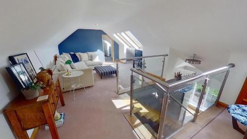 an overhead view of a living room with a fish tank at Luxury Wild Atlantic Way accommodation with sea views and free wifi in Bruckless