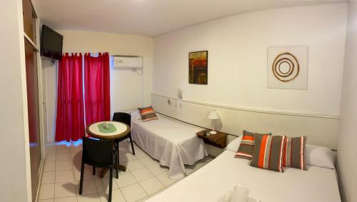 Postel nebo postele na pokoji v ubytování Portillo Apartments