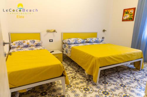 Giường trong phòng chung tại Le Coco Beach Apartaments