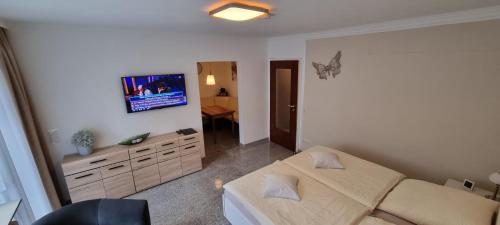Ein Bett oder Betten in einem Zimmer der Unterkunft Bonsai-Apartment II