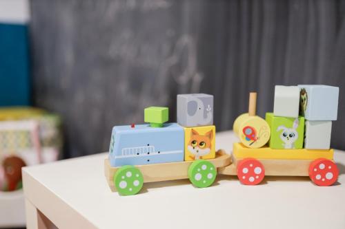 a toy train sitting on top of a table at Willa MM Kaszuby in Łapalice