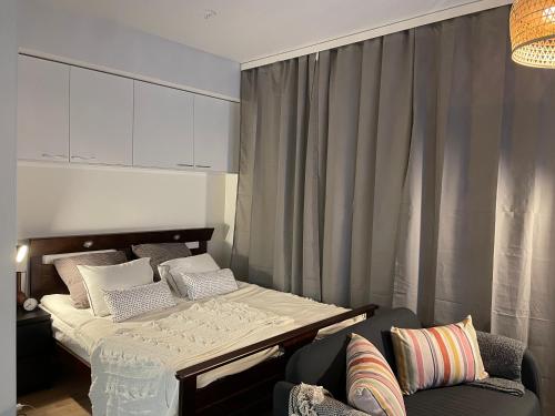 Un pat sau paturi într-o cameră la lux home