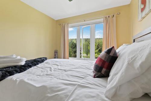 En eller flere senge i et værelse på Luxurious Sierra Lane Escape