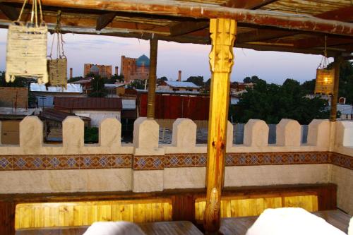 a view of a city from the roof of a building at Hotel Caravan Serail in Samarkand