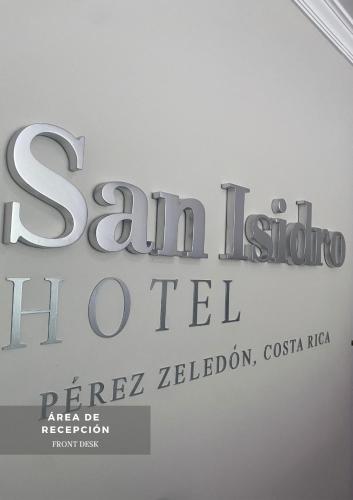a sign for a showroom in a building at Hotel San Isidro in San Isidro