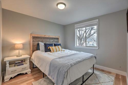 a bedroom with a bed and a window at Family-Friendly Redmond Getaway Walk to Dtwn in Redmond