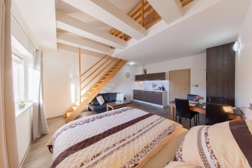 Posteľ alebo postele v izbe v ubytovaní Apartmány Sophia 7