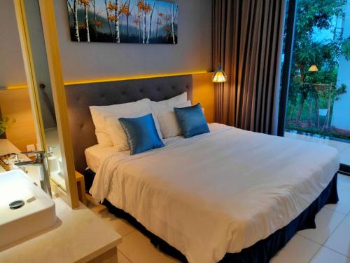 Postel nebo postele na pokoji v ubytování Villa Biển - Oceanami Resort Long Hải