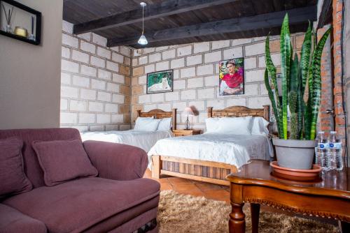 Giường trong phòng chung tại Rancho los olivos Habitaciones Campestres