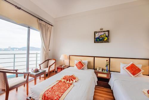 Cama o camas de una habitación en Seagull Hotel