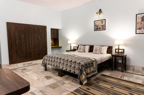 A bed or beds in a room at Hamir Villa - A Boutique Stay