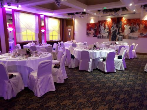a room with white tables and chairs with white tablecloths at Hotel Du Parc - Mulhouse Centre in Mulhouse