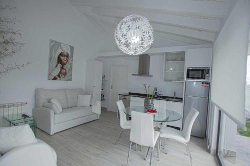 Kuchyň nebo kuchyňský kout v ubytování Apartamentos Turísticos VillaCordido Villaframil Ribadeo