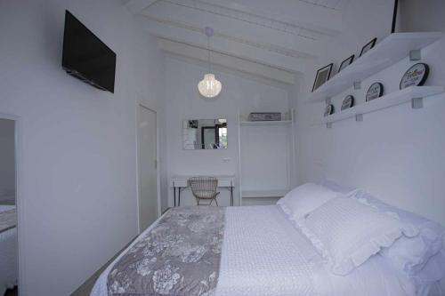 Apartamento Blanco VillaCordido, Villaframil – Updated 2022 ...