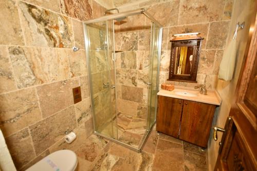 Ένα μπάνιο στο NOSTALJİ CAVE SUİT HOTEL