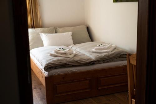 Postel nebo postele na pokoji v ubytování Statek Dolní Suchá