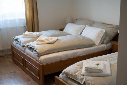 Postel nebo postele na pokoji v ubytování Statek Dolní Suchá