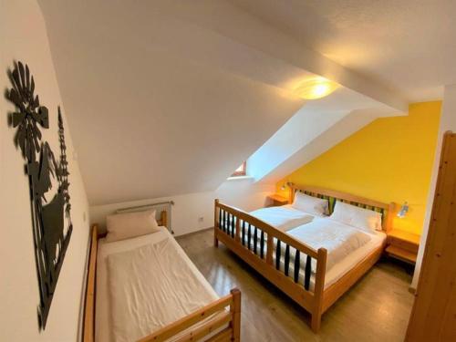 Voodi või voodid majutusasutuse Ferienhof Schlag toas