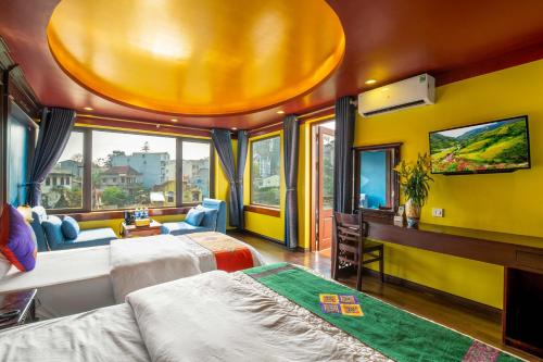 Postel nebo postele na pokoji v ubytování Sapa House Hotel Halal Certified