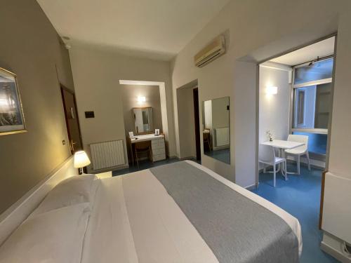 Cama o camas de una habitación en Hotel Posta
