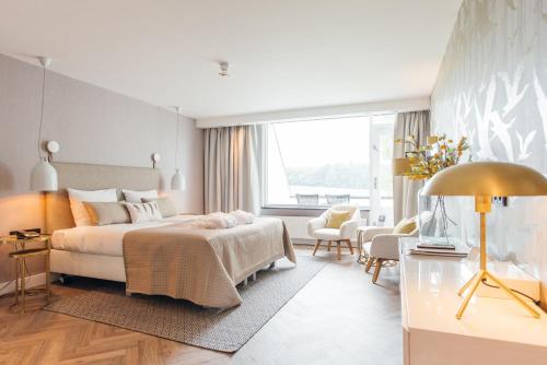 Letto o letti in una camera di Van der Valk Hotel Apeldoorn - de Cantharel