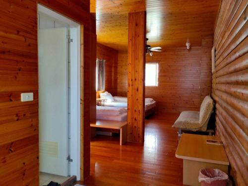 Postel nebo postele na pokoji v ubytování Peach Holiday Manoranor