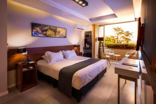 Krevet ili kreveti u jedinici u okviru objekta Pinares del Cerro Resort & Suites