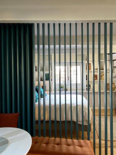 a bed in a crib in a room at Paradise Penthouse Suite Amazing View in Rome
