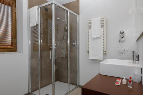 Kúpeľňa v ubytovaní Hotel Lancaster