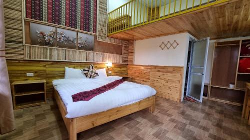 Postel nebo postele na pokoji v ubytování Dang Khoa Homestay