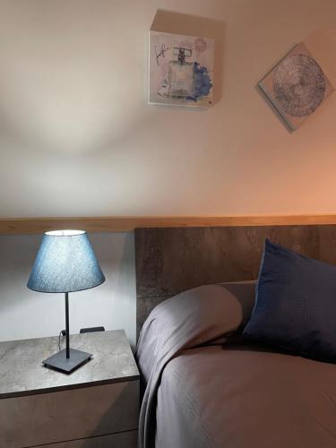 Postel nebo postele na pokoji v ubytování Trastevere & Gianicolo Sweet Rest