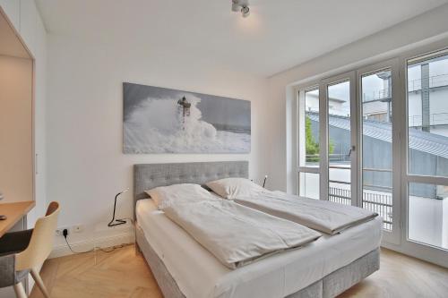 Postel nebo postele na pokoji v ubytování Seaside Seaside Appartement 18