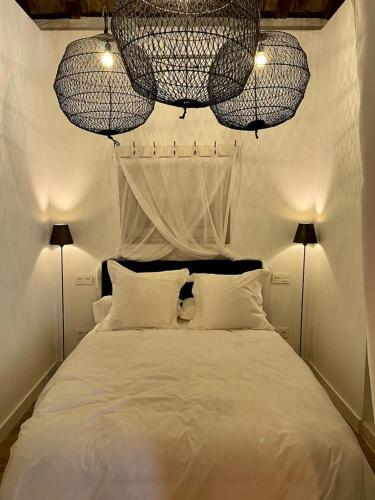Un pat sau paturi într-o cameră la LA CASITA DE SAN ENRIQUE