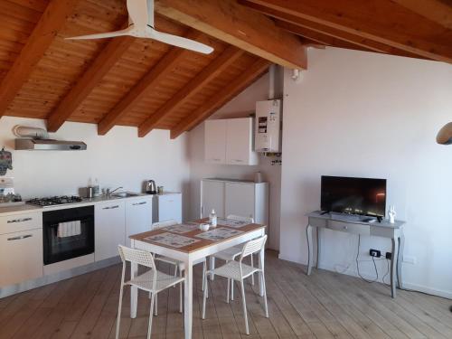 Kuchyň nebo kuchyňský kout v ubytování A Casa di Sole