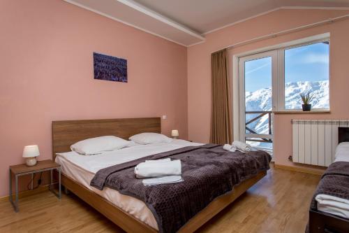 Postel nebo postele na pokoji v ubytování Hotel VERANDA