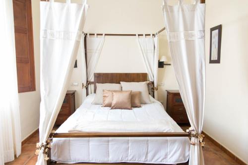 Ліжко або ліжка в номері Casa Rural Aire