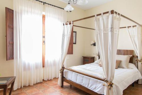Cama o camas de una habitación en Casa Rural Aire
