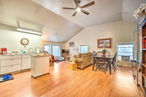 a living room with a ceiling fan and a table at Dog Heaven Clarendon Studio about 15 Mi to Skiing in Rutland