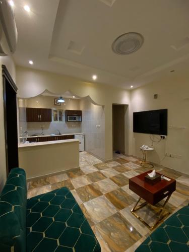 Virtuvė arba virtuvėlė apgyvendinimo įstaigoje فندق زهرة الربيع zahrat alrabie Hotel