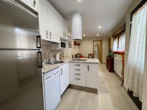 Η κουζίνα ή μικρή κουζίνα στο Apartamentos turísticos Pidal 3 VUT-09-316